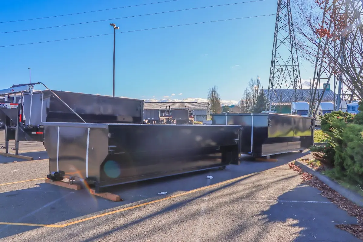 Roll-off dumpster ready for waste disposal at job site for 2 Yard Dumpster Rental in Harpswell